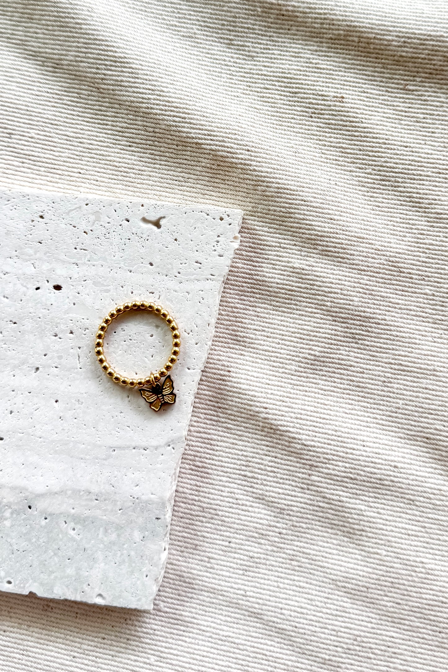 THE BUTTERFLY CHARM RING