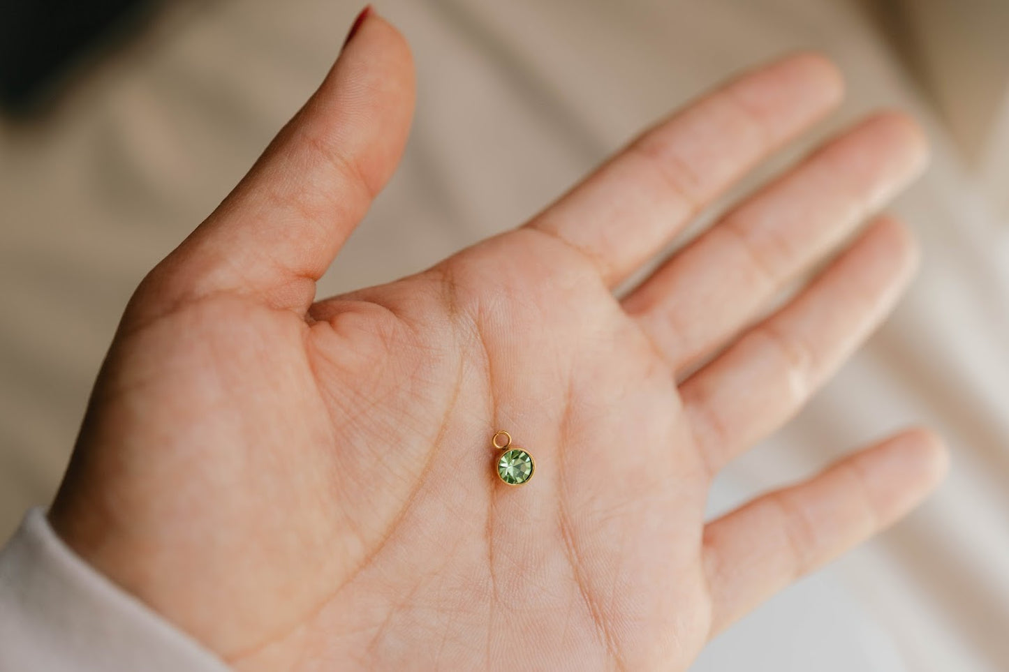 THE AUGUST PERIDOT