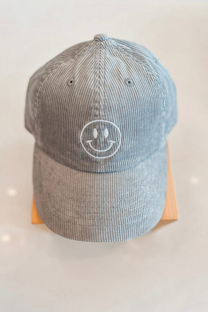 HAPPY FACE EMBROIDERED CORDUROY CAP