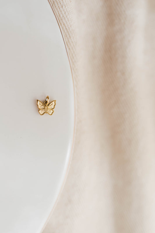 THE LITTLE GOLD BUTTERFLY